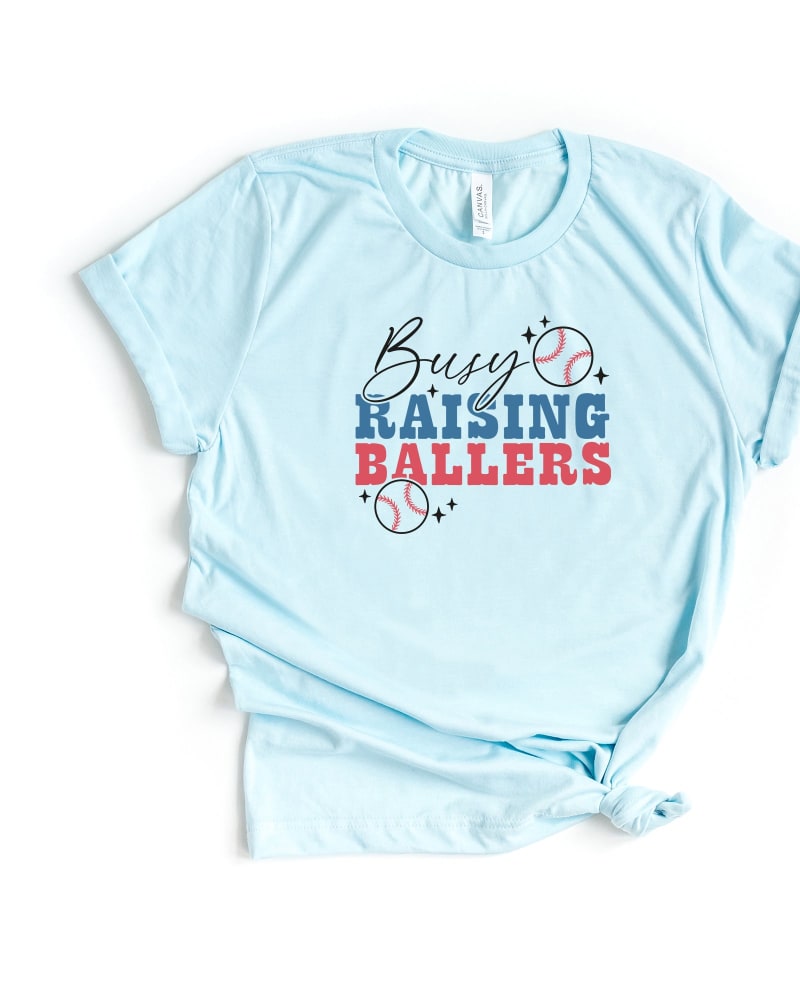 Front of a size Large Busy Raising Ballers Colorful in Ice Blue by Simply Sage Market. | dia_product_style_image_id:281751
